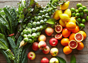 a group of fruits and vegetables on a wood surface Healthy Weight Loss Diets Taunton